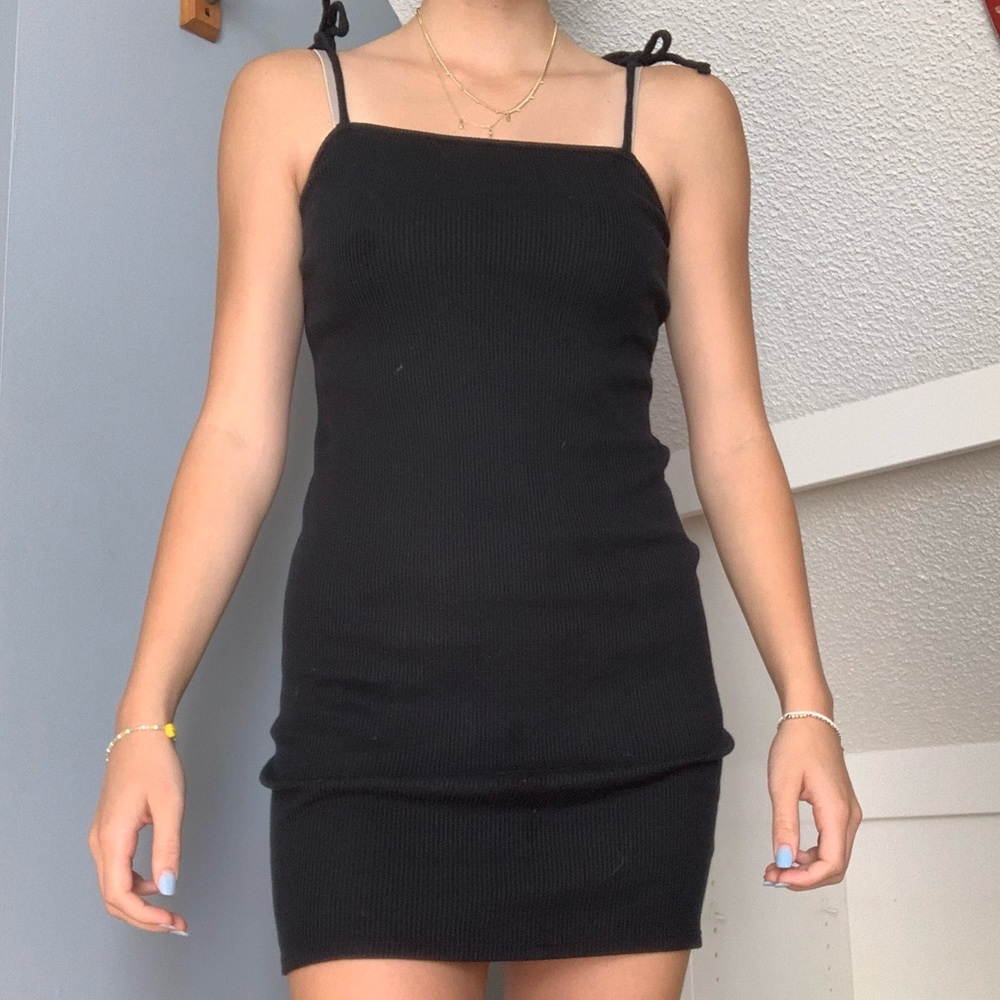 Little black dress. Tie straps, simple, stretchy.